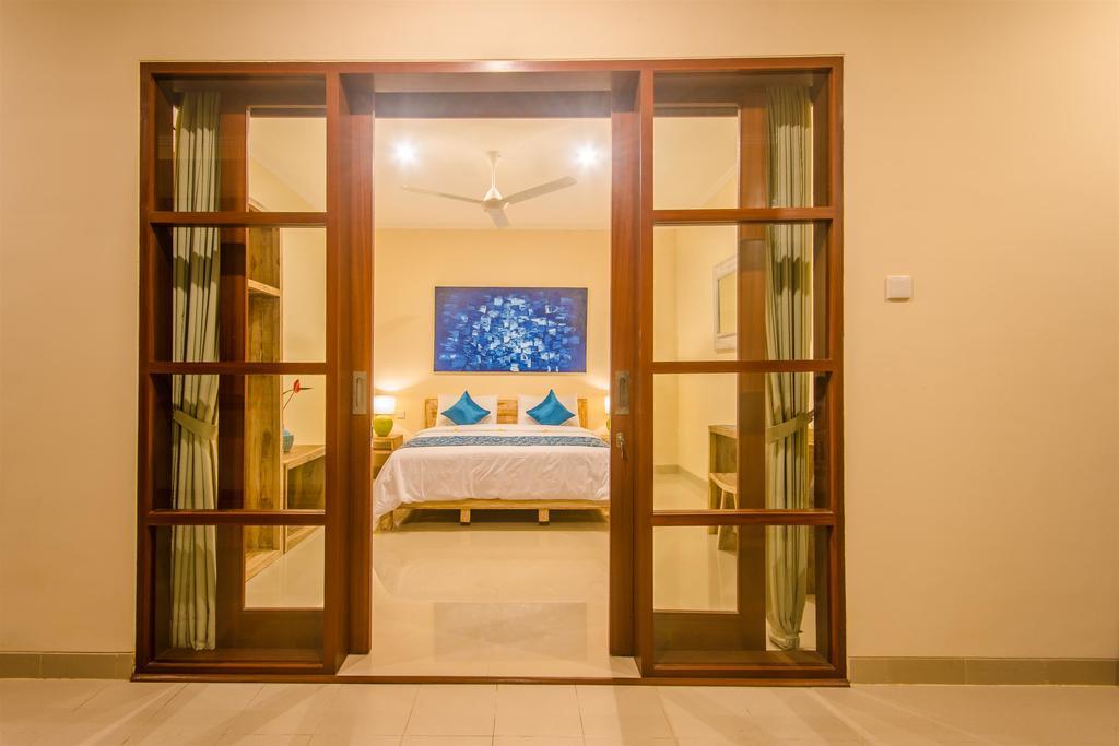 Villa Tepi Sungai Legian Habitación foto