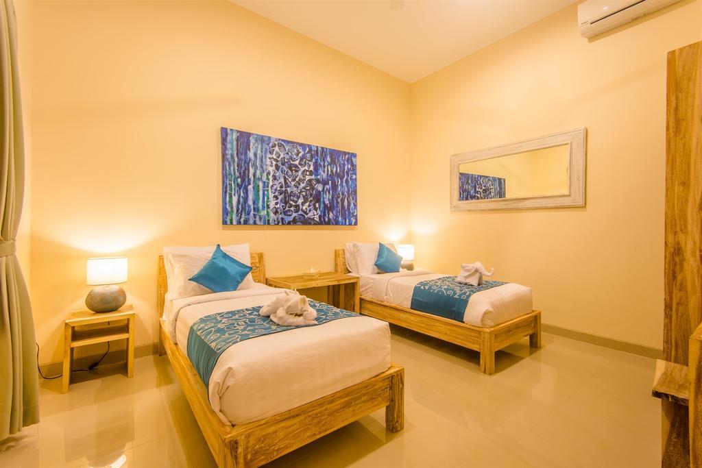 Villa Tepi Sungai Legian Habitación foto
